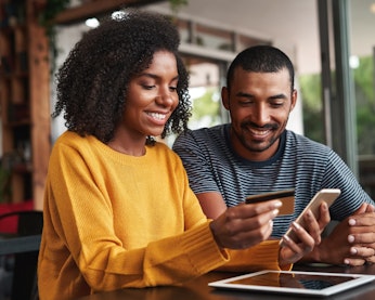 Woman and man shopping online