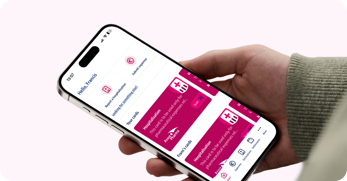 A person holding a phone with the Vanbreda app open