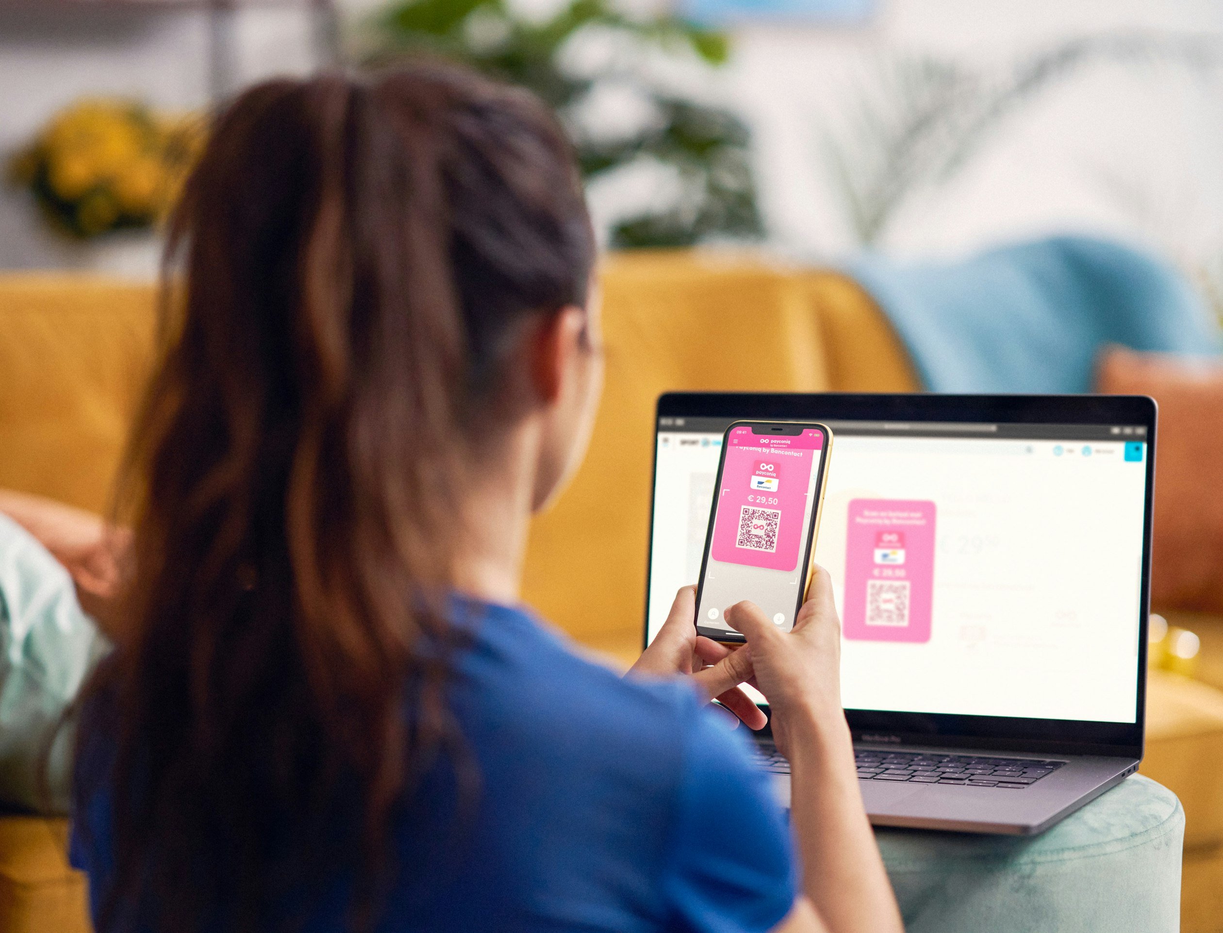 A person using payconic on their phone